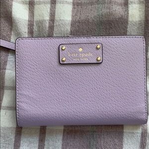 Kate spade compact multi slot wallet.